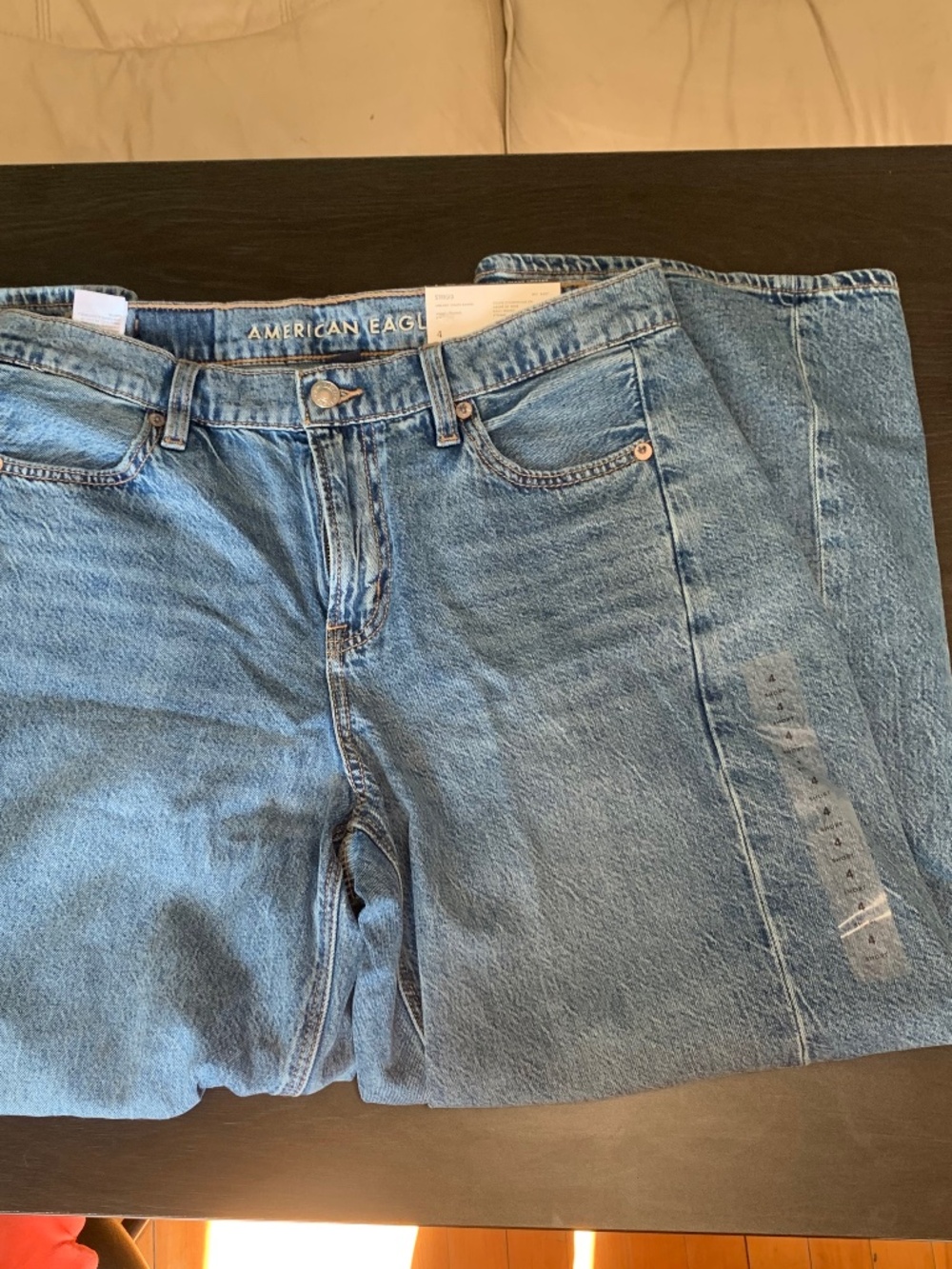 Medium wash barrel jeans